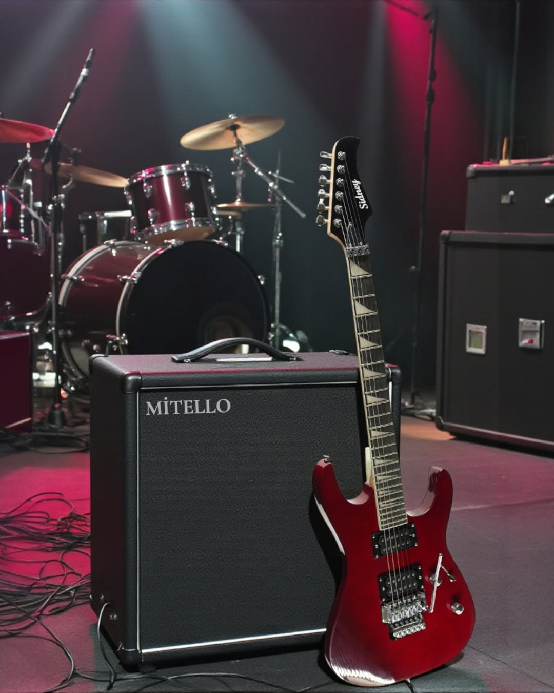 Kırmızı elektro gitar ve Mitello amfi